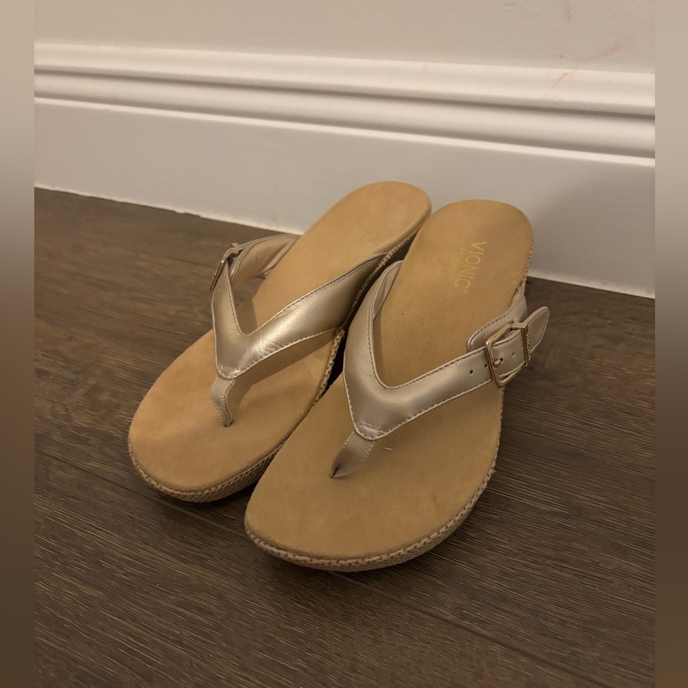 Vionic Women’s Polina Gold Leather Wedge Thong Sandals